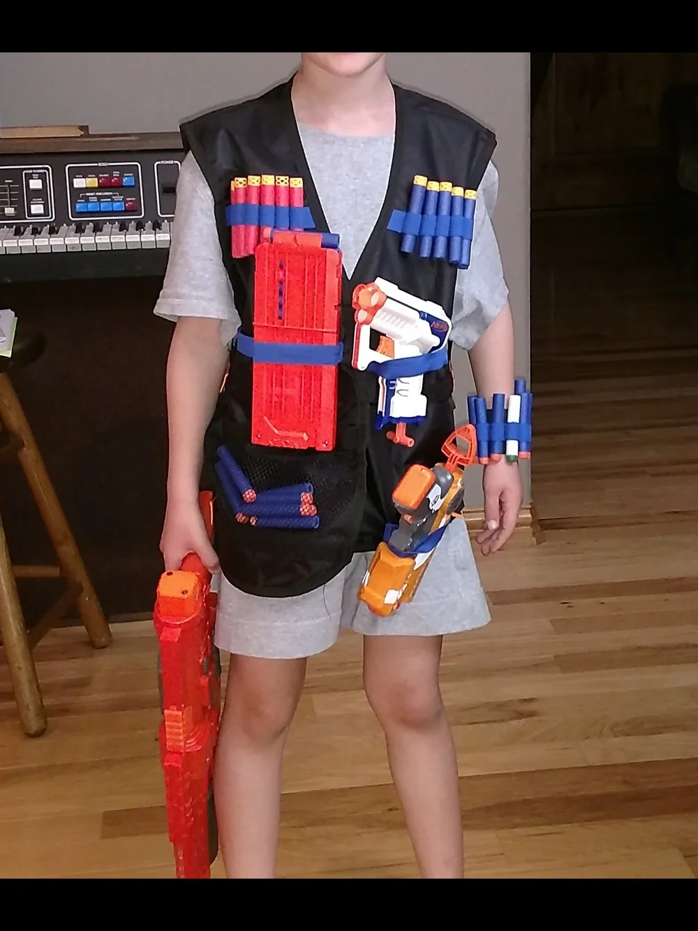 Kids Black Foam Dart Vest with Blue and Orange Accents